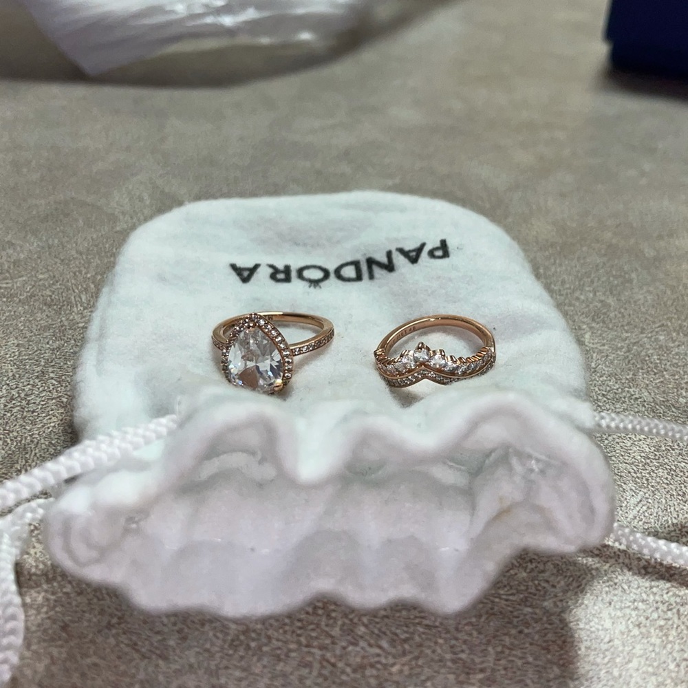 Pandora rose gold tear drop halo ring and and princess wishbone ring stack